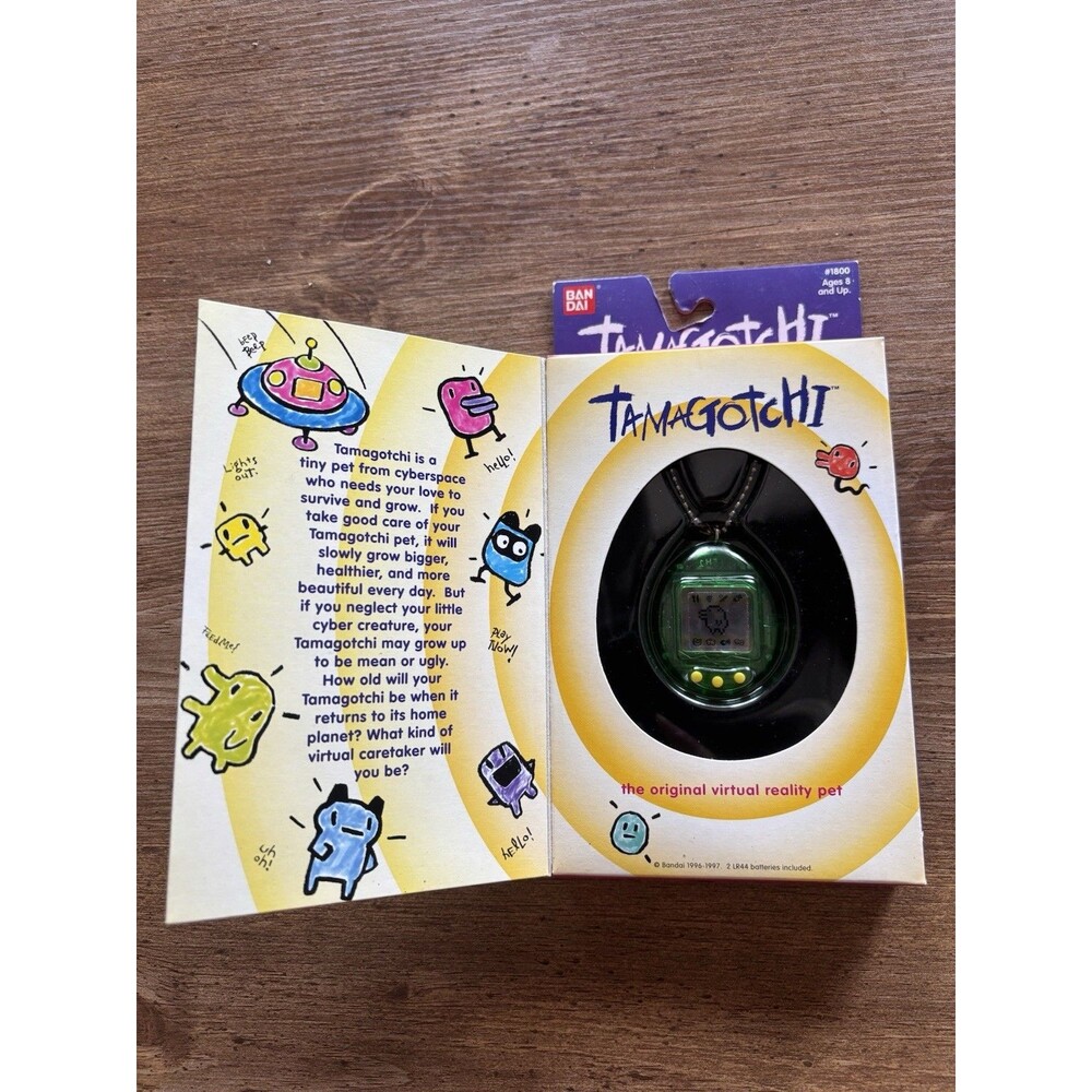1997 Bandai Original Tamagotchi Green Virtual Reality Pet #1800 Boxed